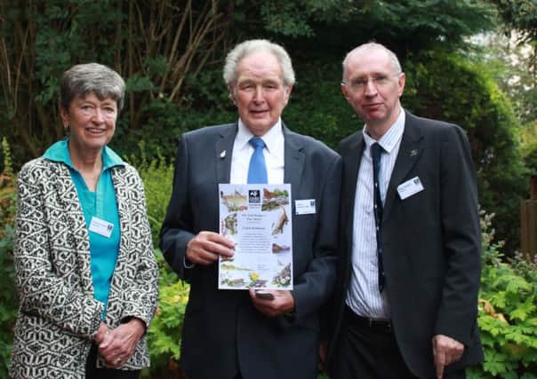 Anne Powell, Chairman, and Peter Bullard, Director of Cumbria Wildlife Trust with Cedric Robinson MBE, who received an award for his contribution to supporting local wildlife.