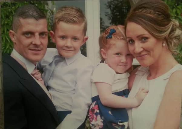 Neil Marshall with his wife Kim, son Max and daughter Daisy at Kim's brother Ryan's wedding in August.