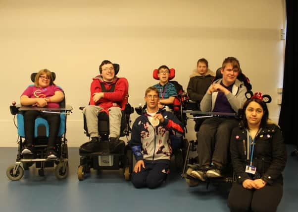 Paralympian Graeme Ballard with students at Beaumont College on a recent visit.