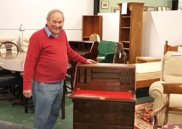 Allan Blackburn in the new furniture section at GB Antiques Centre.