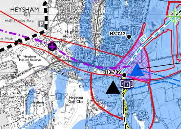 A map of Heysham showing where the extended substation and new tunnel head will go (blue triangle) close to the existing substation (black triangle) and the route of the new underground tunnel (purple dash line).