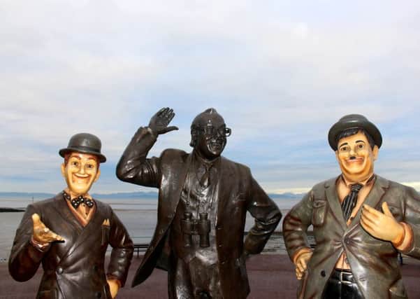 Laurel and Hardy meet the Eric Morecambe Statue.