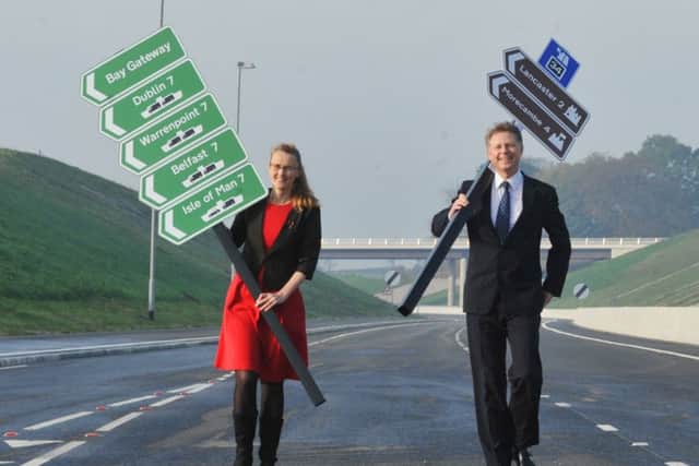 LANCASTER and MORECAMBE  31-10-16
MP Cat Smith and MP David Morris on the Bay Gateway.
Celebrations at the opening of the Bay Gateway, the new M6 link road, Heysham, developed by Costain. Local delegates were invited onto the road before it opened to traffic.