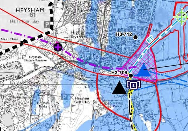A map of Heysham showing where the extended substation and new tunnel head will go (blue triangle) close to the existing substation (black triangle) and the route of the new underground tunnel (purple dash line).