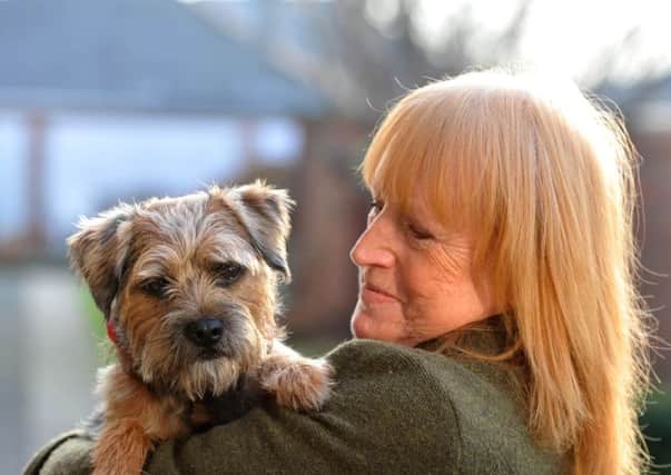 Photo Neil Cross
Billy the Border Terrier with Barbara Woodhead at Draycombe Court, Heysham, where Billy has been her companion since her husband, Phil, died
