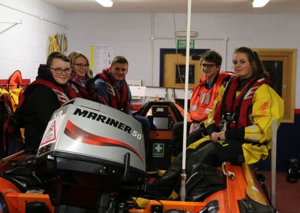 Members of the Morecambe Sailing Club during a visit to Morecambe Lifeboat station.