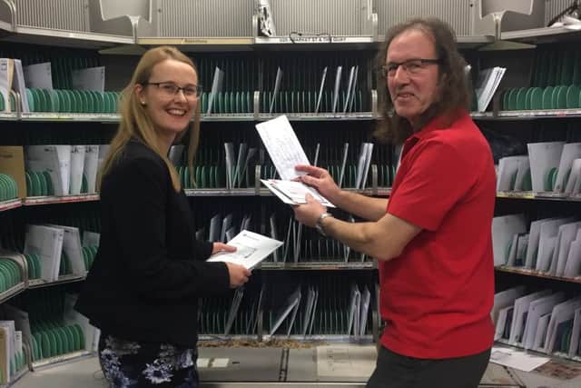 Cat Smith MP with a postman at Lancaster sorting office.