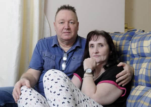 CARER: Curtis Philips cares for his wife Katie full time but Lancashire County Council are now reducing his hours.