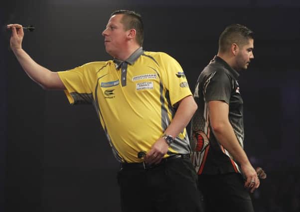Dave Chisnall saw off Jelle Klaasen in their last 16 clash. Picture: Lawrence Lustig.