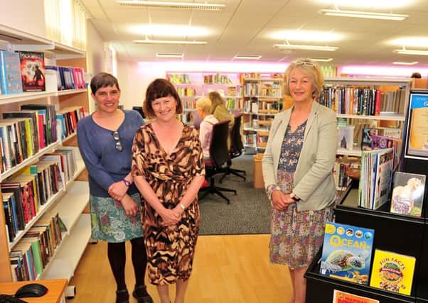 Photo: David Hurst Bolton Le Sands Library service Manager, Ros Sudworth, centre, with County Councillor Chris Henig, right, and Lancaster District Manager, Debbie Dawson, left, at the re-opening of the library after refurbishment
