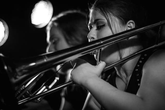 Becca Pattison on trombone