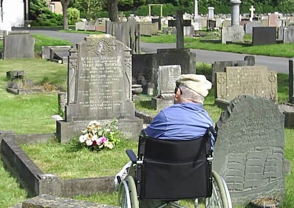 Richard Thorton visiting his mother's grave in Torrisholme.