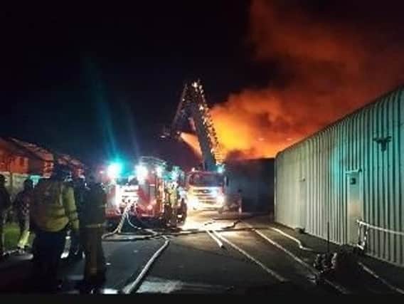 Taylors Lane, School Lane and Lancaster Road are currently closed while 40 fire fighters and eight enginesare at the scene .