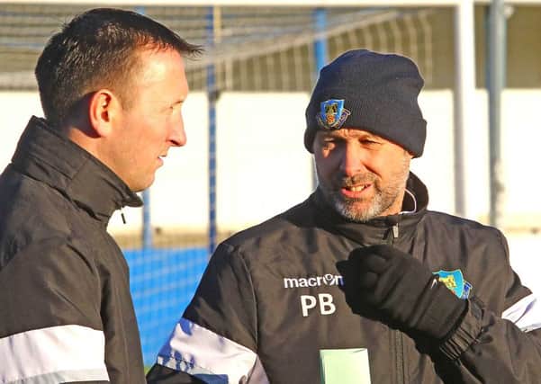 Phil Brown and his assistant Dave McCann. Picture: Tony North