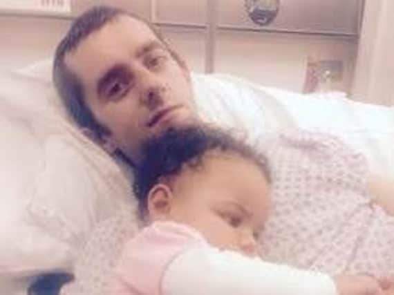 Victim Stuart Currey pictured in hospital