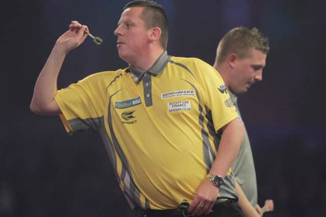 Dave Chisnall on his way to victory over Chris Dobey at the recent World Darts Championships. Picture: Lawrence Lustig/PDC