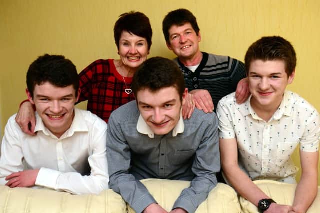 Triplets Sammy, Nathan and Alex with mum Jan and Dad Steve Heywood at their home in Caton near Lancaster.