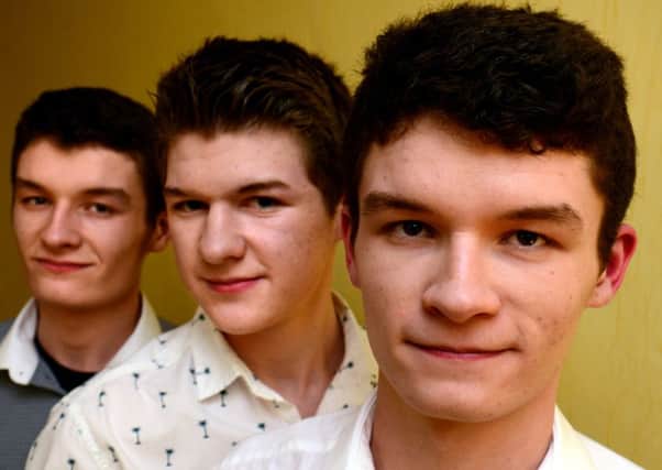 Triplets Nathan, Alex and Sammy Heywood from Caton.