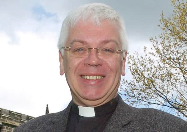 The vicar of Lancaster the Rev Chris Newlands.