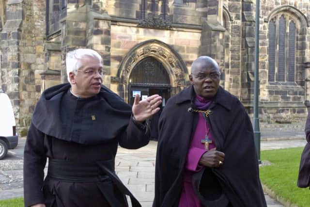 The Archbishop of York Dr John Sentamu with the Vicar of Lancaster Priory the Rev Chris Newlands.