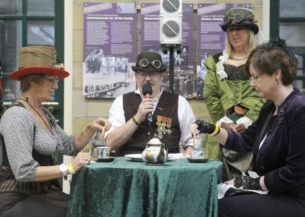 Steampunk craft day at The Platform.  Janice Barnes and Amanda Gray take part in Tea Duelling.