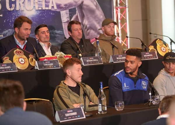 Tomi Tatham takes a question from promoter Eddie Hearn at Tuesdays press conference in Manchester. Picture: Karen Priestley