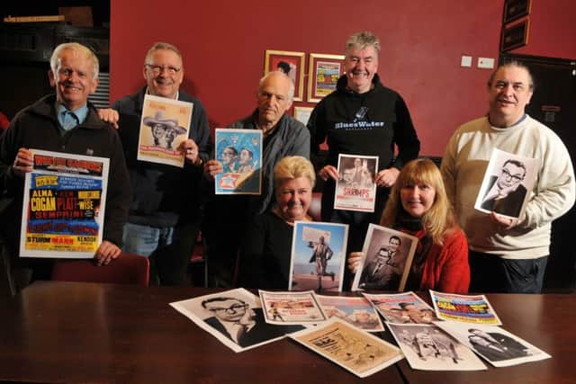 Photo Neil Cross: Volunteers at the Winter Gardens theatre looking ahead to the new year, with their new Eric Morecambe photos to be displayed on a new Morecambe and Wise wall in the bar