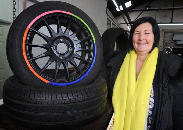 Owner of Westgate Tyres in Morecambe Jane Bailey has been clear of cancer for three years, and during that time has organised various fundraising events for CancerCare.
Jane in the workshop.  PUIC BY ROB LOCK
30-1-2017