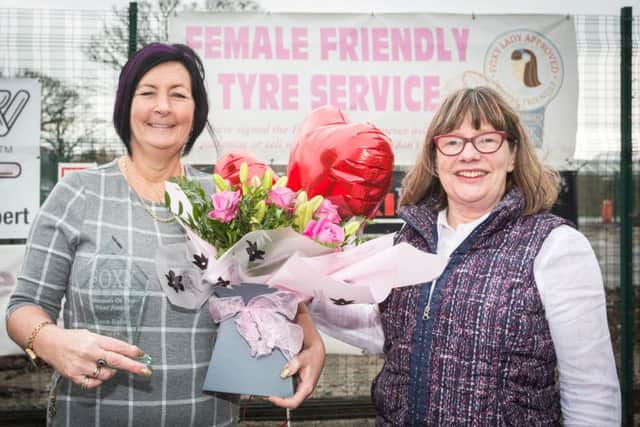 From left: owner of Westgate Tyres Jane Bailey being presented with her award by Steph Savill, director of Foxy Lady Drivers Club.