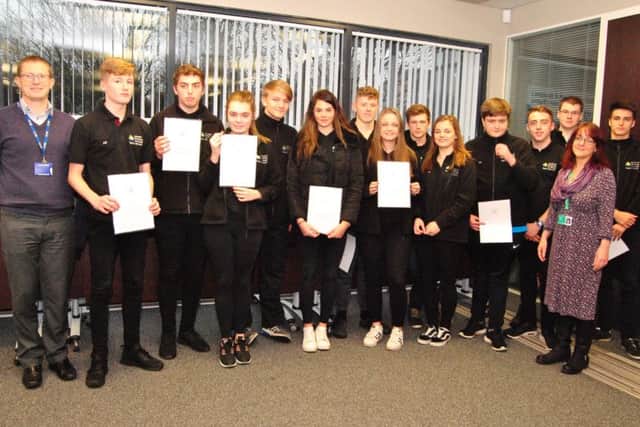 Public service students with their NCS certificates and tutors.