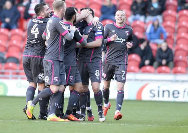 Morecambe players celebrating their goal at Doncaster Rovers last Saturday.