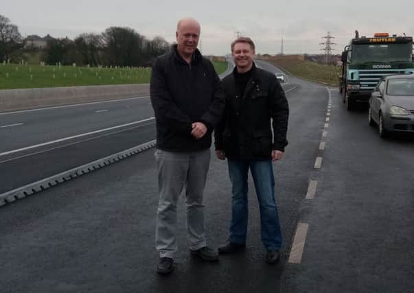 Transport Secretary Chris Grayling with Morecambe and Lunesdale MP David Morris on his visit to see the new M6 link road.