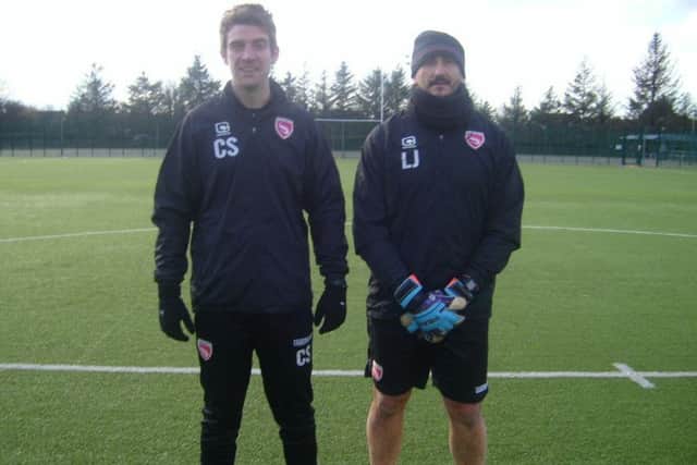 Chris Squirrell, Morecambe FC fitness coach and Lee Jones, the Shrimps' goalkeeping coach.