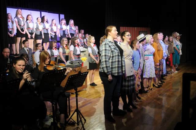 The cast of 9 to 5 at Morecambe Community High School.