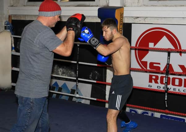 Isaac Lowe being put through his paces by Dave Hulley at Freedom ABC in Doncaster. Picture: Chris Etchells