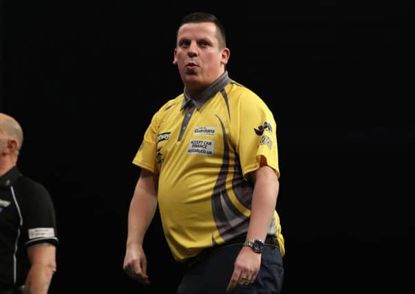 Dave Chisnall was beaten by Jelle Klaasen. Picture: Lawrence Lustig.