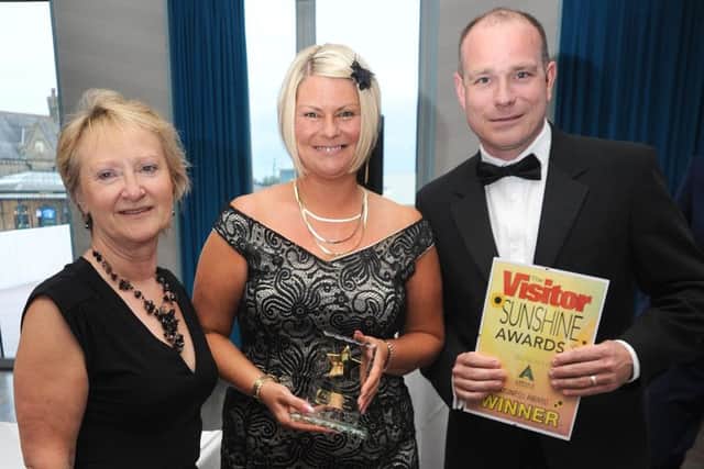 Sue Byers, then-manager of the Arndale Morecambe Bay, presents the Sunshine Business Award 2016 to Rob and Debbie Ellershaw of The Exchange pub.  PIC BY ROB LOCK 13-5-2016
