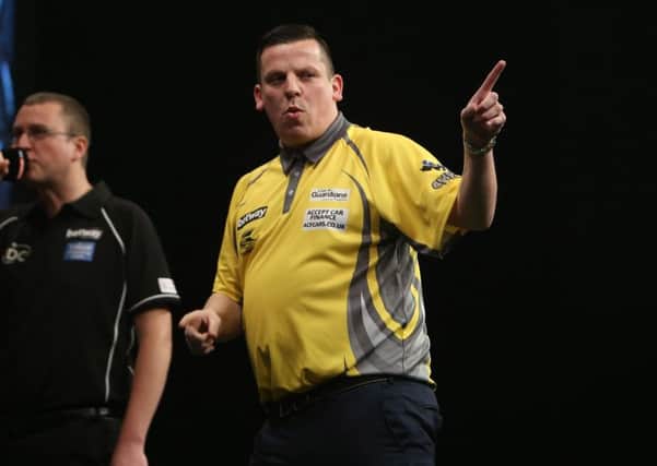 Dave Chisnall will play twice on Thursday night in the Betway Premier League. Picture: Lawrence Lustig.