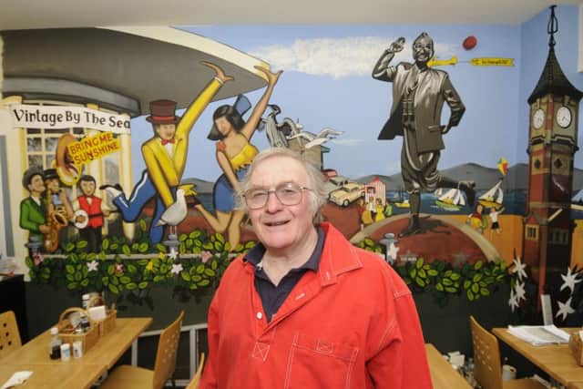 Artist Bob Pickersgill has painted a mural inside The Star Cafe at the Festival Market