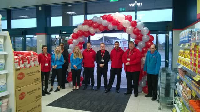 Staff at the new Home Bargains superstore on Westgate at the official opening on Saturday.