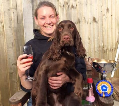 Caroline Smith with Truffle, the field spaniel, who will be competing in the vulnerable native breeds final at Crufts live on Friday at 6pm.