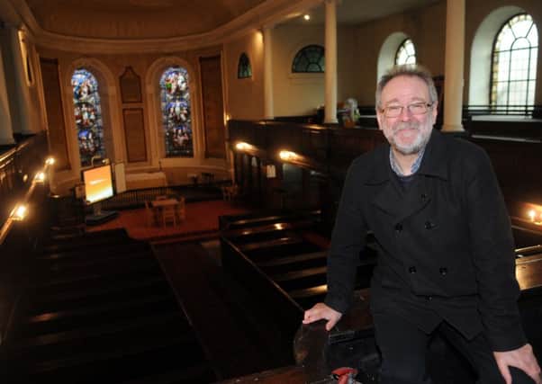 Bruce Crowther at St John's Church in Lancaster where he is setting up the Fig Tree, formally situated in Garstang