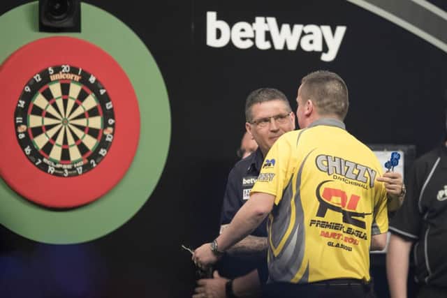 Gary Anderson wins his match against Dave Chisnall. Picture: Matchroom Steve Welsh.