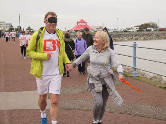 Stephen and Diane Hughes during Galloway's blindfold run.