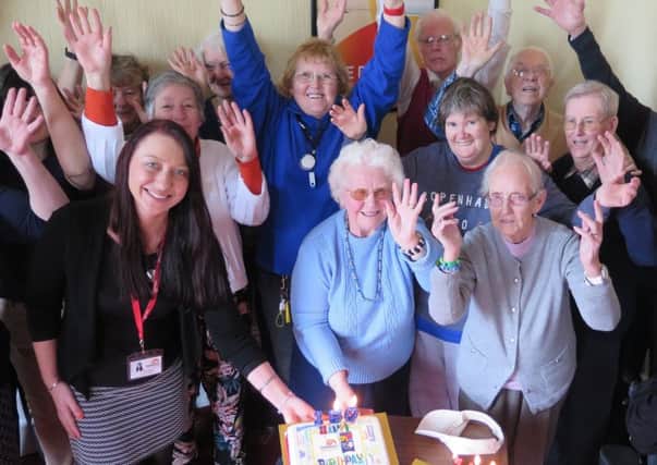 Staff and service users at Galloway's celebrating their 150 year milestone.