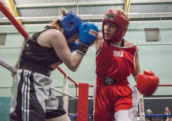 Alex Zawadzki (right) in boxing action at Lancaster and Morecambe College. Photo by Rachel Landsborough.