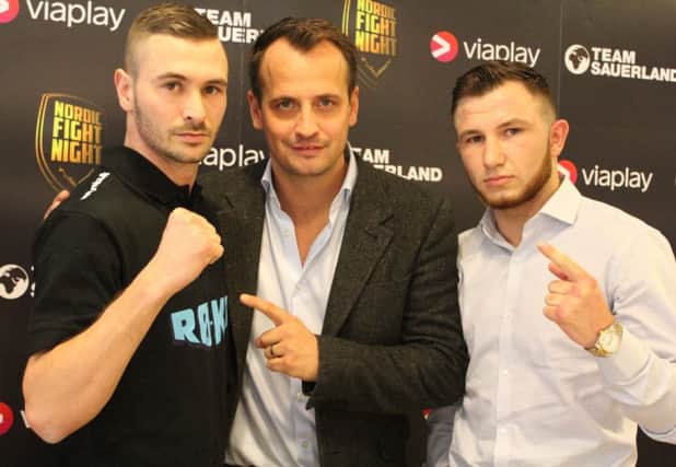 Isaac Lowe and Dennis Ceylan with promoter Nisse Sauerland.