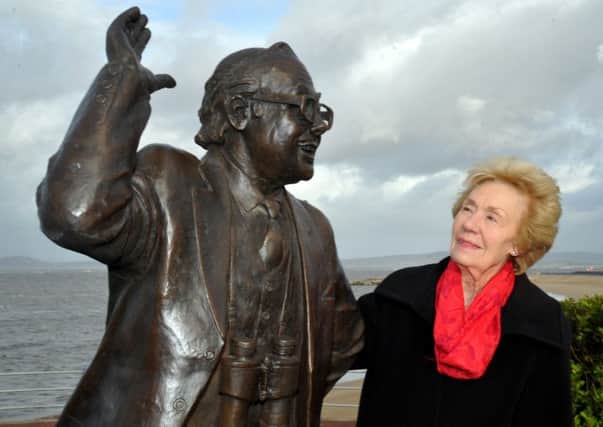 Eric Morecambe's widow Joan with the statue of her husband.