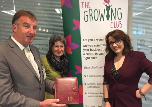 Steve Hughes of BNI welcomes Jane Binnion and Rachel Holme of the Growing Club.