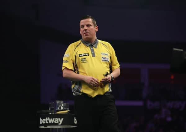Dave Chisnall was beaten by Michael van Gerwen at the Motorpoint Arena in Cardiff on Thursday night. Picture: Lawrence Lustig.